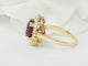 Bague 54 Bague entourage en or jaune, rubis et diamants 58 Facettes F5046