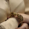 Bracelet Bracelet jonc Zolotas "Tetes de Belier" en or jaune 18K avec emeraudes, saphirs et rubis - 73,30 g 58 Facettes FB10527