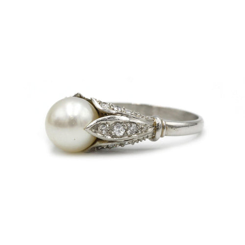 Bague 52 Bague or, diamants et perle 58 Facettes 1150