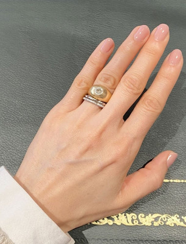 Bague bombée en or jaune 18K et diamant