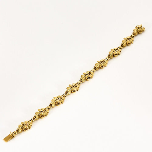 Bracelet Bracelet en or jaune à motif de fleurs et de feuilles ciselées 58 Facettes MON1100X2