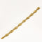 Bracelet Bracelet en or jaune à motif de fleurs et de feuilles ciselées 58 Facettes MON1100X2