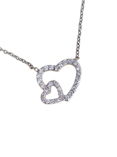 Collier Collier cœur en or blanc et diamants 58 Facettes