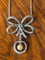 Collier Collier noeud, diamants et perles, fin XIXéme 58 Facettes