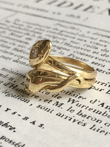 Bague 51 Bague ancienne en or jaune 18K représentant deux serpents 58 Facettes