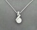 Collier Collier en or blanc avec perle et diamants 58 Facettes 10852