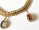 Bracelet Bracelet maille américaine or jaune 18 carats et breloques - 17 cms - 36.25 grs 58 Facettes