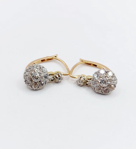 Boucles d'oreilles Dormeuses marguerite - Boucles d’oreilles en or 18k, platine et diamants 58 Facettes A06632
