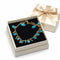 Bracelet Bracelet en or jaune avec perles turquoise et breloques décoratives 58 Facettes 50402
