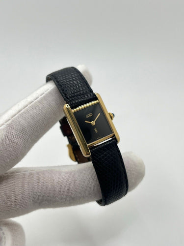 Montre Cartier - Montre Tank Must Vermeil cadran noir 20 x 28 mm 58 Facettes