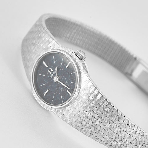 Montre OMEGA Montre de dame en or blanc 58 Facettes B250590