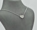 Collier Collier en or blanc 18 carats avec pendentif en forme de cœur et diamants naturels de 0,21 carat. 58 Facettes 10622
