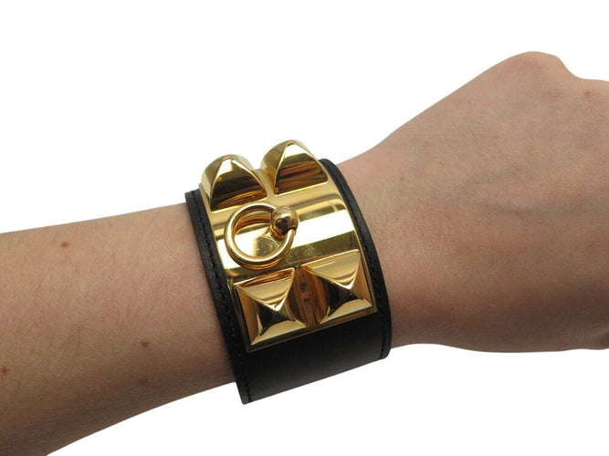 Collier bracelet HERMES collier de chien medor cdc 16cm cuir swift noir metal dore 58 Facettes 268024