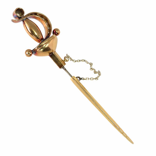 Broche Une broche épée vintage ornée de diamants : une traversée du temps et de la mode 58 Facettes 24246-0390