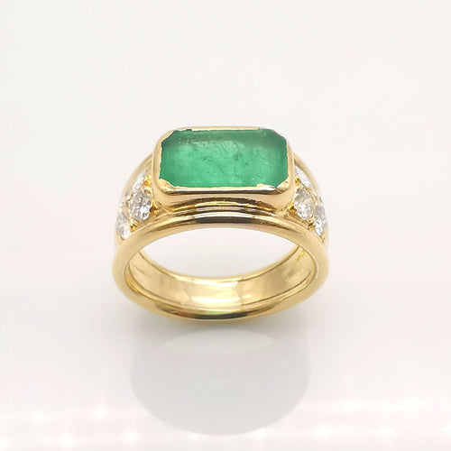 Bague 58 Bague en or jaune, émeraude et diamants 58 Facettes
