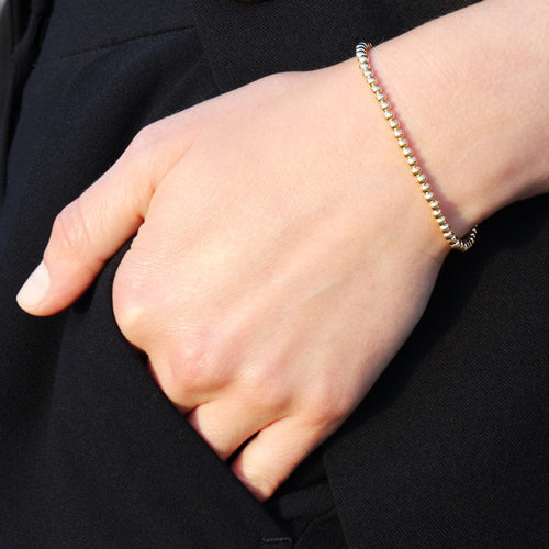 Bracelet Bracelet LUCKY ONE "Perles d'Or" Or Jaune 58 Facettes 58FBRCHBO033
