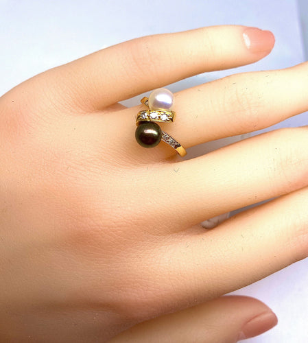 Bague Bague en or jaune 18 carats, perle de Tahiti, perle de culture blanche et diamants 58 Facettes AB264
