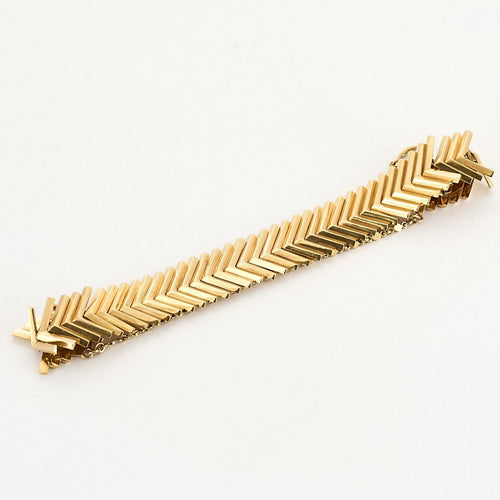 Bracelet Bracelet en or jaune à motif de chevrons 58 Facettes SAP0392