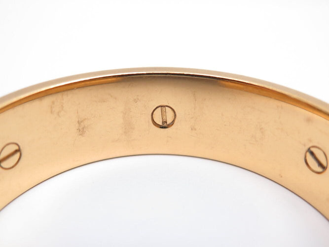 Bracelet bracelet HERMES jonc en cuir rouge et metal dore red  en 58 Facettes 272251
