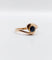 Bague 48 Bague tourbillon or jaune ornée d'un saphir (circa 1920) 58 Facettes A05082