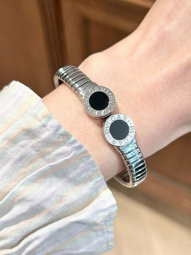 Bracelet BULGARI  - Bracelet Bvlgari acier et onyx 58 Facettes