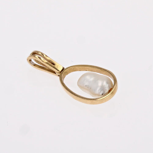 Pendentif Pendentif en or et sa perle baroque 58 Facettes CVP17