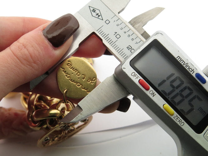Bracelet bracelet gourmette breloques coeur zodiac t18 or jaune 18k 90.5gr charms 58 Facettes 270131