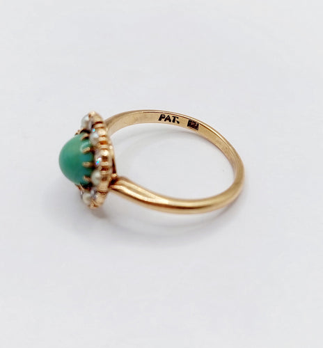 Bague 52.5 Bague marguerite or jaune, cabochon de turquoise, diamants et perles (circa 1900) 58 Facettes A05219