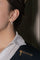 Boucles d'oreilles Boucles d'oreilles Demi créoles Or jaune, Or blanc Diamant 58 Facettes 3855444CN