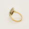 Bague 54 Bague marquise en or jaune et or blanc, émeraude et diamants 58 Facettes B250584