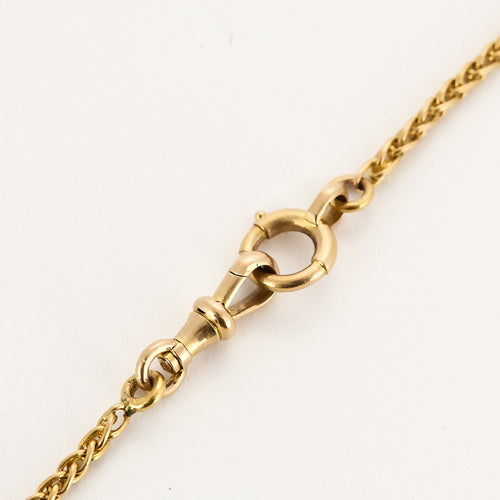 Collier Chaîne en or jaune et coulant Serpent en or gris et diamants et émeraude 58 Facettes SNA1712