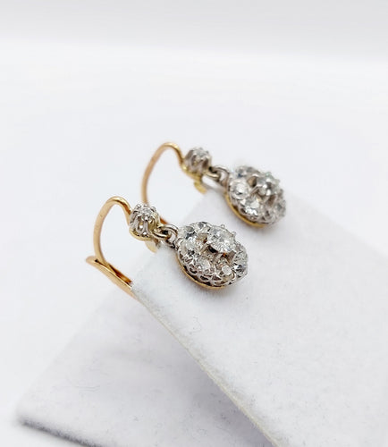 Boucles d'oreilles Dormeuses marguerite - Boucles d’oreilles en or 18k, platine et diamants 58 Facettes A06632