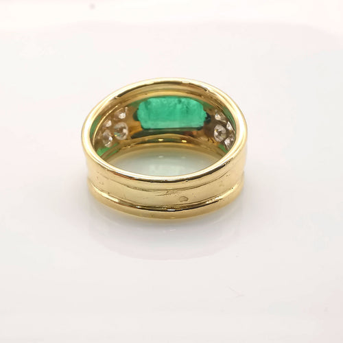 Bague 58 Bague en or jaune, émeraude et diamants 58 Facettes
