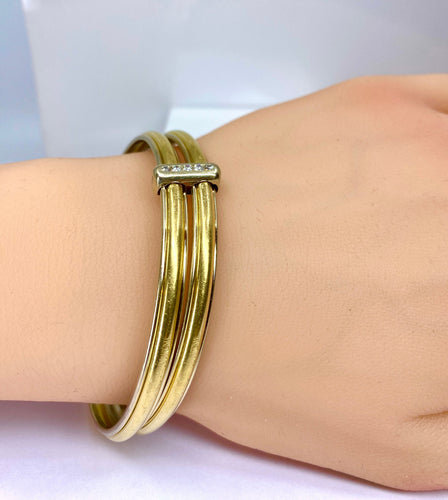 Bracelet Bracelet double joncs, or blanc, diamants, Yves Saint Laurent 58 Facettes AB601