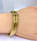 Bracelet Bracelet double joncs, or blanc, diamants, Yves Saint Laurent 58 Facettes AB601