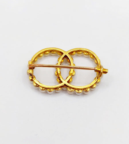 Broche Broche antique or jaune cercles infini et perles 58 Facettes A05616