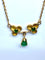 Collier Collier pendentif trilobé en or jaune 18 carats et émeraudes 58 Facettes AB675