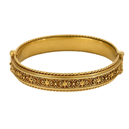 Bracelet Bracelet jonc en or jaune à motif de fleurs 58 Facettes NAR0688