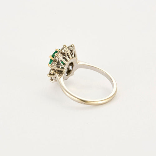 Bague 55 Bague Marguerite or gris et jaune, diamants et émeraude 58 Facettes 250256