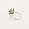 Bague 55 Bague Marguerite or gris et jaune, diamants et émeraude 58 Facettes 250256