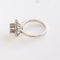 Bague Bague vintage en or blanc sertie de diamants, ornée d'une rosette. 58 Facettes 158/23