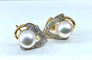 Boucles d'oreilles Boucles d’oreilles en or 18 carats, perles de culture et 14 diamants 58 Facettes AB390