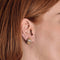 Paire de boucles d'oreilles trois or tressée et diamants