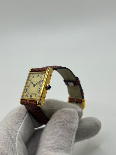 Montre Cartier - Montre Tank Must Vermeil grand modèle en vermeil et argent 58 Facettes