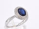 Bague 54 Bague entourage en or blanc avec diamants et saphir 58 Facettes 2044