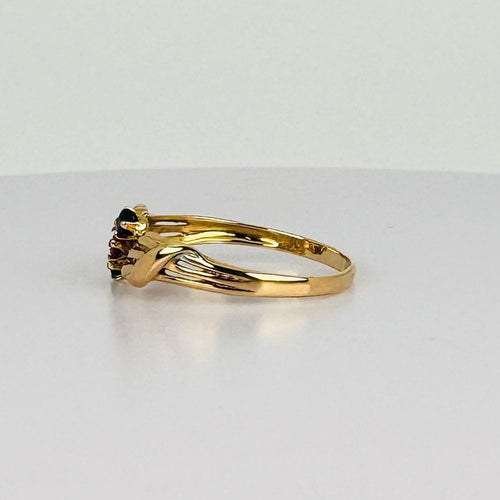 Bague Bague vintage ornée d'un rubis, d'une émeraude et d'un saphir bleu 58 Facettes 2505006