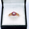 Bague 56.5 Ancienne bague fleur or jaune sertie de rubis et perle 58 Facettes