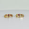Boucles d'oreilles Boucles d’oreilles créoles avec rubis et diamants en or jaune 14k 58 Facettes 2512013