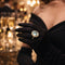 Bague 55 Bague en or jaune de haute joaillerie ornée d'une aigue-marine et d'un halo de diamants 58 Facettes 50357