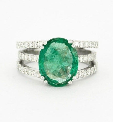 Bague Bague en or blanc émeraude diamants 58 Facettes